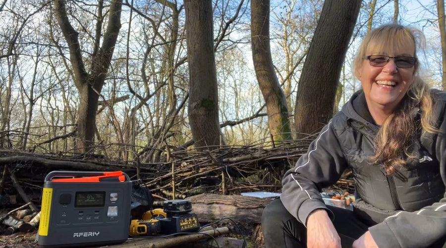 Sarah using an AFERIY power station at work and in the woods